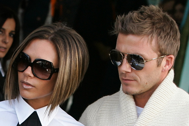 17 Nov 2006, Rome, Italy --- David and Victoria Beckham arrive at Rome's Ciampino airport to attend the wedding of Katie Holmes and Tom Cruise. --- Image by © Tony Gentile/Reuters/Corbis